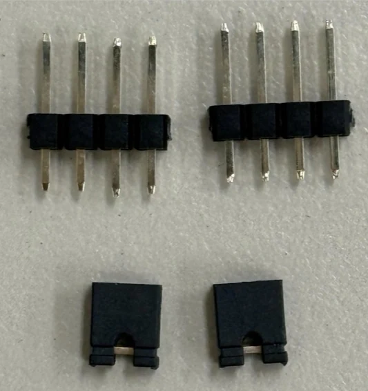 Single-row four-pin headers and jumper pins